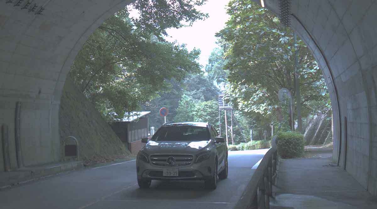 An image of a moving vehicle in a backlit setting with HDR turned on